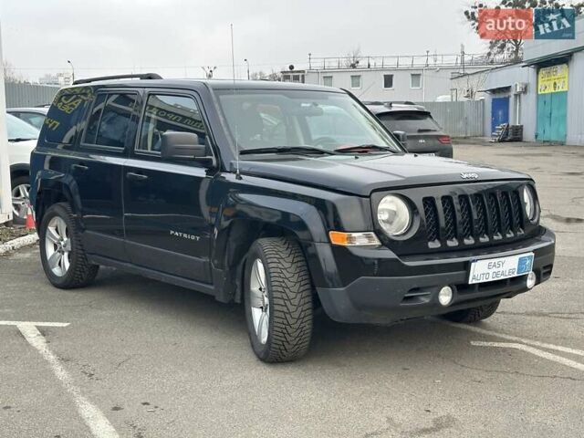 Черный Джип Патриот, объемом двигателя 2.36 л и пробегом 156 тыс. км за 9490 $, фото 3 на Automoto.ua