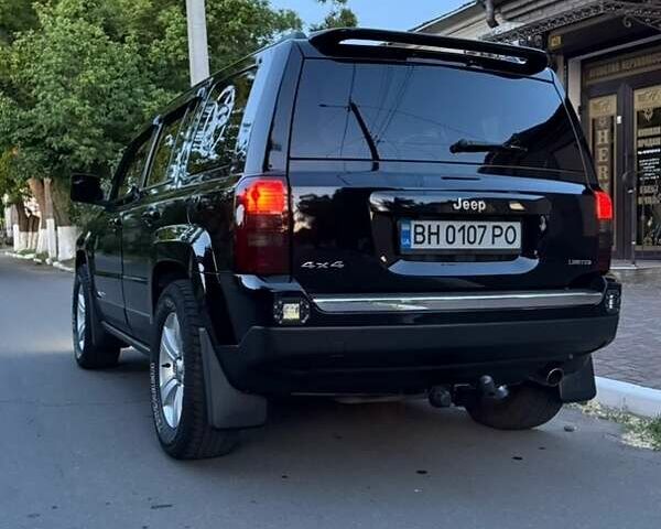 Черный Джип Патриот, объемом двигателя 2.4 л и пробегом 84 тыс. км за 15000 $, фото 5 на Automoto.ua