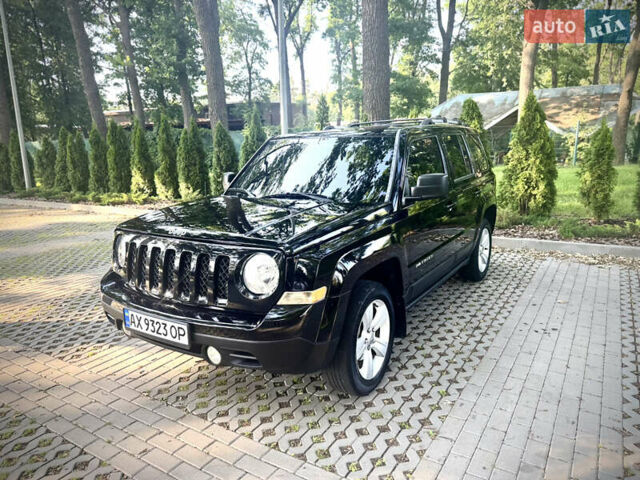 Черный Джип Патриот, объемом двигателя 2.36 л и пробегом 120 тыс. км за 10000 $, фото 1 на Automoto.ua