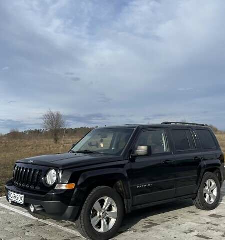 Черный Джип Патриот, объемом двигателя 2.36 л и пробегом 117 тыс. км за 10500 $, фото 1 на Automoto.ua