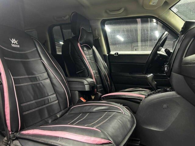 Чорний Джип Patriot, об'ємом двигуна 2.4 л та пробігом 104 тис. км за 11100 $, фото 13 на Automoto.ua