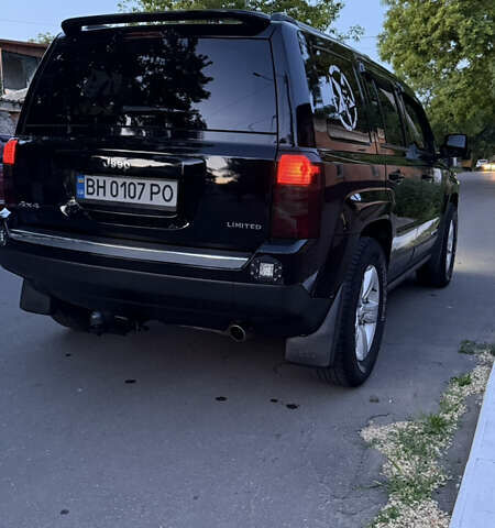 Черный Джип Патриот, объемом двигателя 2.4 л и пробегом 84 тыс. км за 15000 $, фото 8 на Automoto.ua