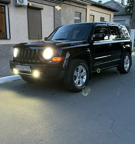 Черный Джип Патриот, объемом двигателя 2.4 л и пробегом 84 тыс. км за 15000 $, фото 12 на Automoto.ua