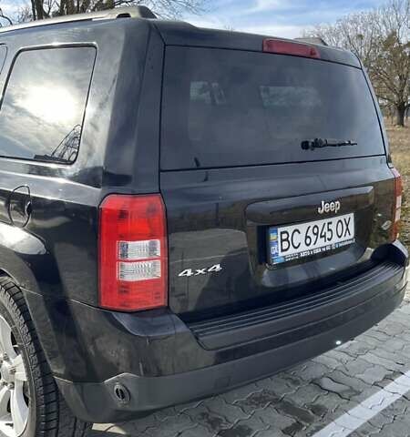 Черный Джип Патриот, объемом двигателя 2.36 л и пробегом 117 тыс. км за 10500 $, фото 2 на Automoto.ua