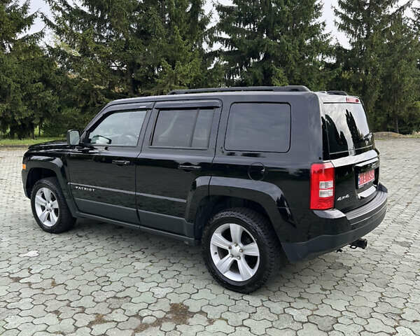 Джип Патриот 2014 в Дубно на Automoto.ua Черный Джип Патриот, объемом двигателя 2.4 л и пробегом 236 тыс. км за 8800 $, фото 34 на Automoto.ua