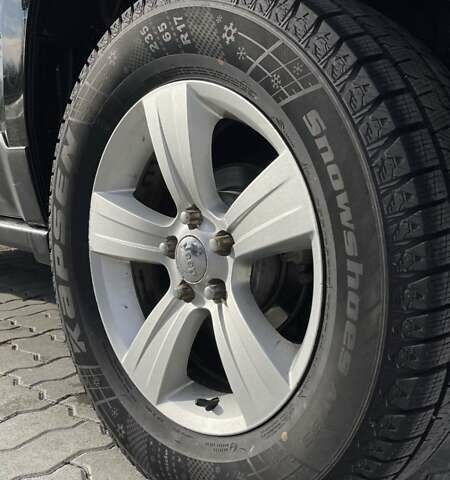 Черный Джип Патриот, объемом двигателя 2.36 л и пробегом 117 тыс. км за 10500 $, фото 3 на Automoto.ua