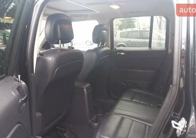 Черный Джип Патриот, объемом двигателя 2.36 л и пробегом 180 тыс. км за 9700 $, фото 6 на Automoto.ua