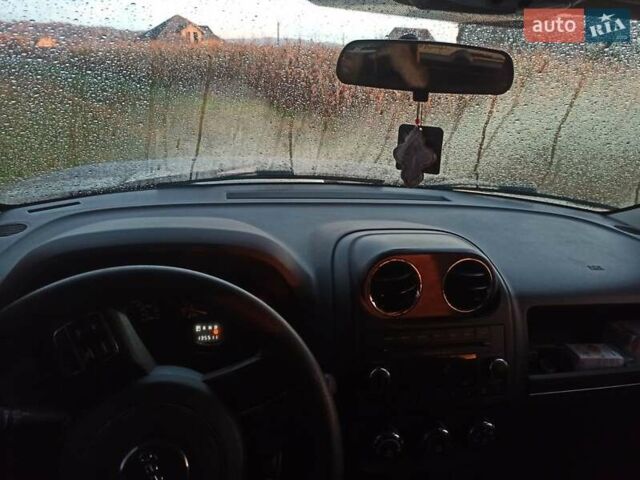 Черный Джип Патриот, объемом двигателя 2 л и пробегом 135 тыс. км за 9900 $, фото 12 на Automoto.ua