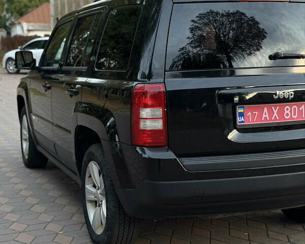 Черный Джип Патриот, объемом двигателя 2.4 л и пробегом 197 тыс. км за 9999 $, фото 55 на Automoto.ua