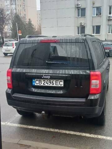 Черный Джип Патриот, объемом двигателя 2.36 л и пробегом 180 тыс. км за 9700 $, фото 3 на Automoto.ua