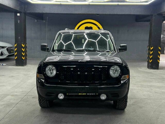 Чорний Джип Patriot, об'ємом двигуна 2.4 л та пробігом 104 тис. км за 11100 $, фото 1 на Automoto.ua