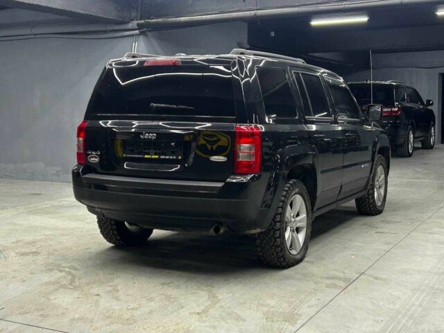 Чорний Джип Patriot, об'ємом двигуна 2.4 л та пробігом 104 тис. км за 11100 $, фото 5 на Automoto.ua