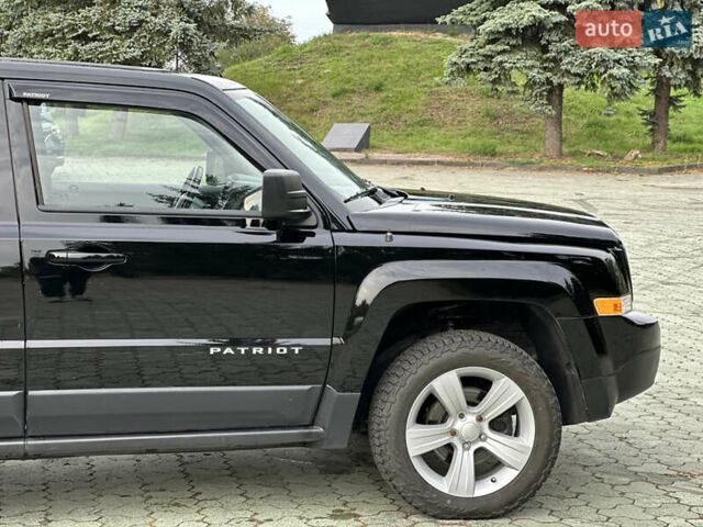 Джип Патриот 2014 в Дубно на Automoto.ua Черный Джип Патриот, объемом двигателя 2.4 л и пробегом 236 тыс. км за 8800 $, фото 6 на Automoto.ua