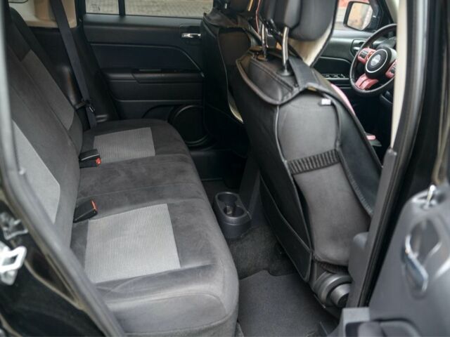 Черный Джип Патриот, объемом двигателя 2.4 л и пробегом 102 тыс. км за 10800 $, фото 4 на Automoto.ua