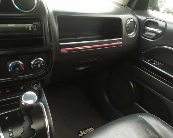 Чорний Джип Patriot, об'ємом двигуна 2.36 л та пробігом 195 тис. км за 8500 $, фото 1 на Automoto.ua