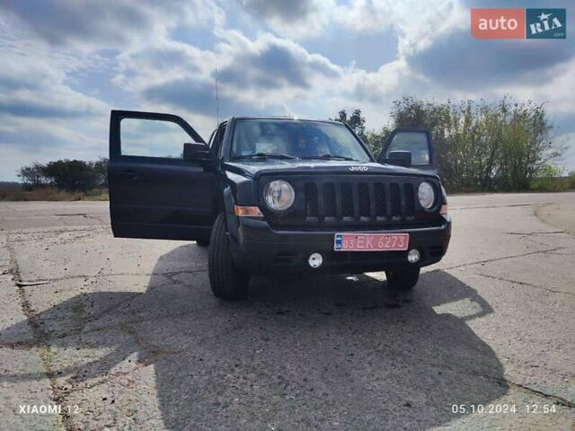 Черный Джип Патриот, объемом двигателя 2.4 л и пробегом 182 тыс. км за 10400 $, фото 7 на Automoto.ua