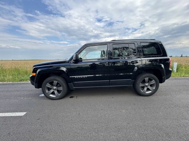 Черный Джип Патриот, объемом двигателя 2.4 л и пробегом 169 тыс. км за 11100 $, фото 1 на Automoto.ua