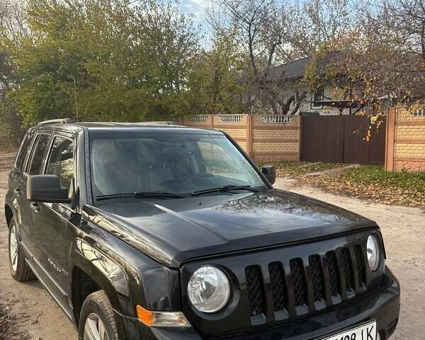 Черный Джип Патриот, объемом двигателя 2.36 л и пробегом 144 тыс. км за 10500 $, фото 11 на Automoto.ua