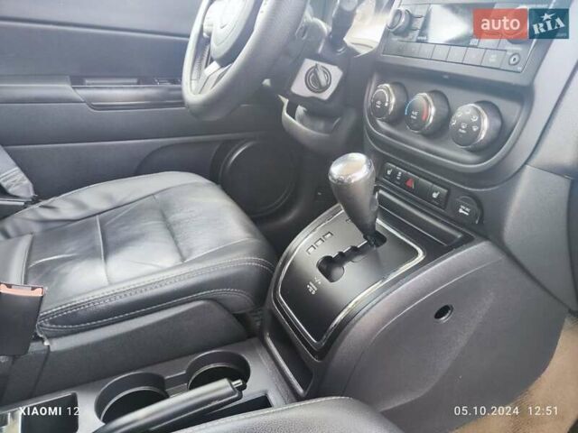 Черный Джип Патриот, объемом двигателя 2.4 л и пробегом 182 тыс. км за 10400 $, фото 4 на Automoto.ua