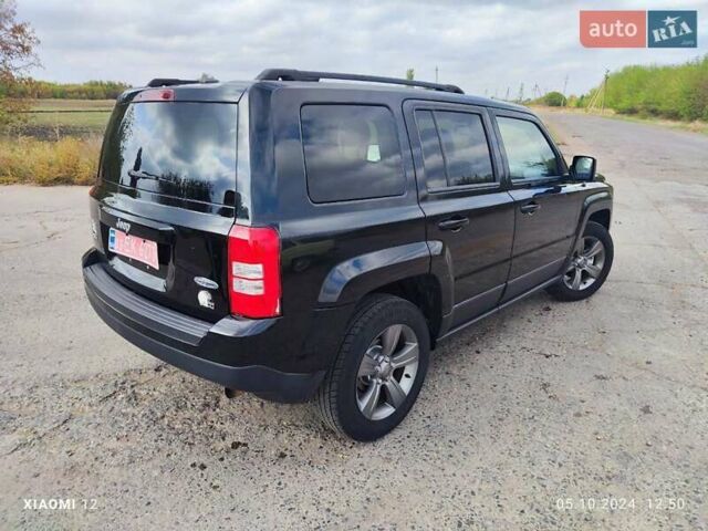 Черный Джип Патриот, объемом двигателя 2.4 л и пробегом 182 тыс. км за 10400 $, фото 3 на Automoto.ua