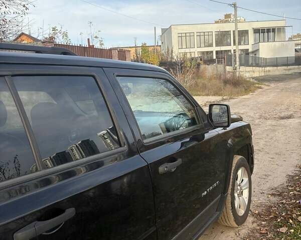 Черный Джип Патриот, объемом двигателя 2.36 л и пробегом 144 тыс. км за 10500 $, фото 10 на Automoto.ua