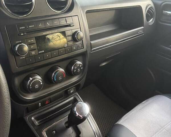 Черный Джип Патриот, объемом двигателя 2.36 л и пробегом 144 тыс. км за 10500 $, фото 16 на Automoto.ua