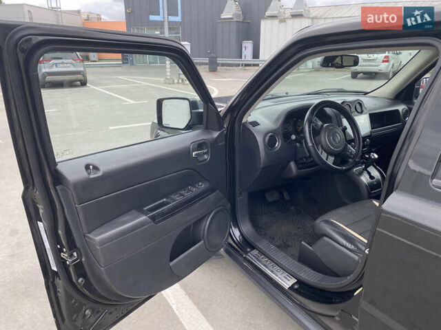 Черный Джип Патриот, объемом двигателя 2.36 л и пробегом 143 тыс. км за 10900 $, фото 3 на Automoto.ua