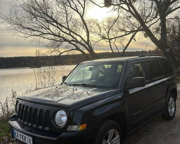 Черный Джип Патриот, объемом двигателя 2.36 л и пробегом 144 тыс. км за 10500 $, фото 14 на Automoto.ua