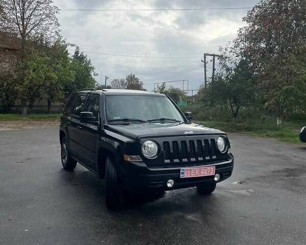 Черный Джип Патриот, объемом двигателя 2.4 л и пробегом 182 тыс. км за 10400 $, фото 10 на Automoto.ua