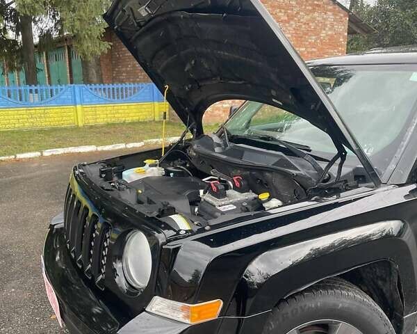 Черный Джип Патриот, объемом двигателя 2.4 л и пробегом 182 тыс. км за 10400 $, фото 9 на Automoto.ua