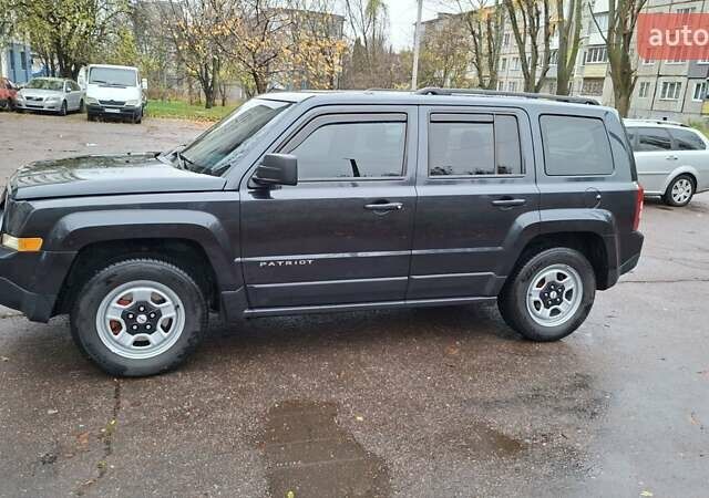 Черный Джип Патриот, объемом двигателя 2.36 л и пробегом 187 тыс. км за 10800 $, фото 7 на Automoto.ua