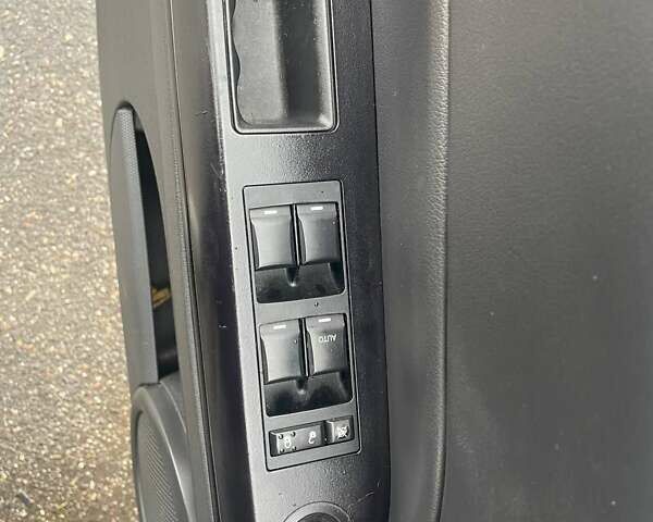 Черный Джип Патриот, объемом двигателя 2.4 л и пробегом 182 тыс. км за 10400 $, фото 12 на Automoto.ua