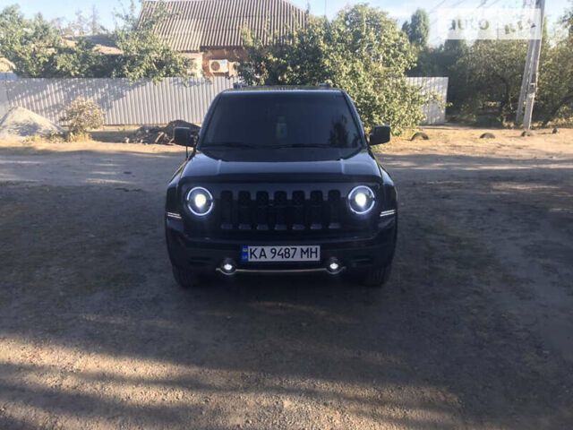 Черный Джип Патриот, объемом двигателя 2.36 л и пробегом 165 тыс. км за 13000 $, фото 1 на Automoto.ua