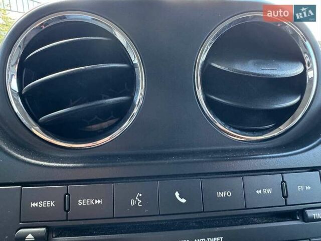 Чорний Джип Patriot, об'ємом двигуна 2.36 л та пробігом 123 тис. км за 10690 $, фото 19 на Automoto.ua