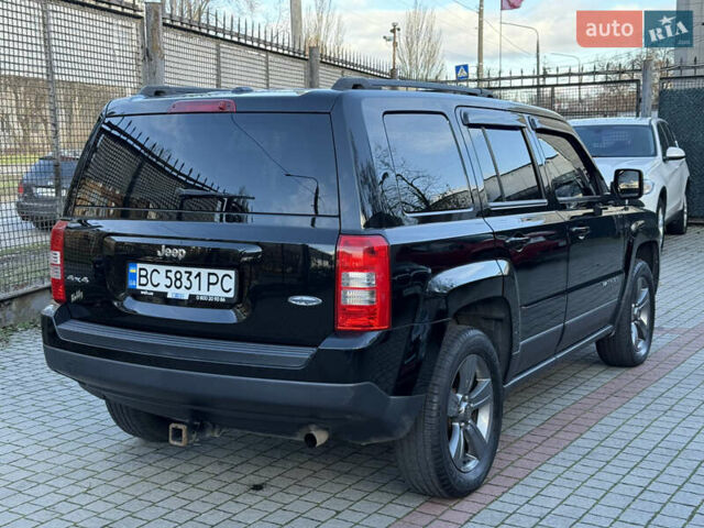 Чорний Джип Patriot, об'ємом двигуна 2.4 л та пробігом 128 тис. км за 10300 $, фото 6 на Automoto.ua