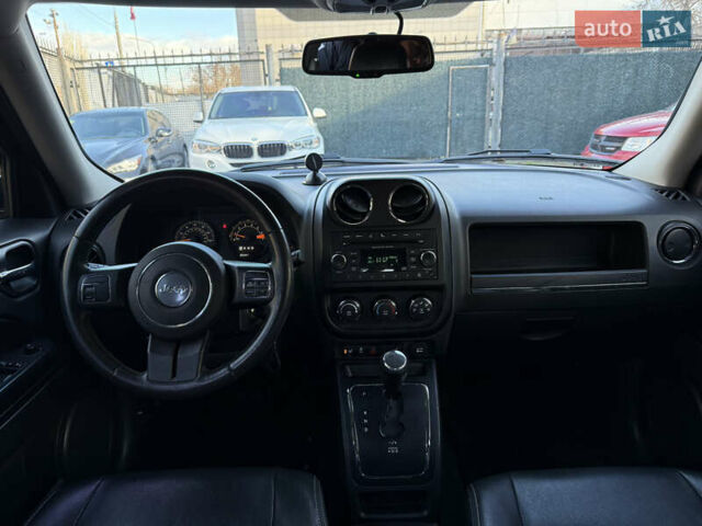 Чорний Джип Patriot, об'ємом двигуна 2.4 л та пробігом 128 тис. км за 10300 $, фото 9 на Automoto.ua