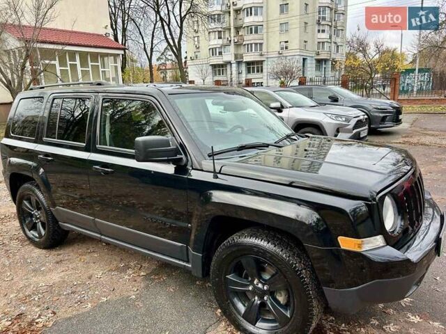 Чорний Джип Patriot, об'ємом двигуна 2.36 л та пробігом 188 тис. км за 12500 $, фото 2 на Automoto.ua