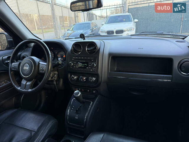 Чорний Джип Patriot, об'ємом двигуна 2.4 л та пробігом 128 тис. км за 10300 $, фото 12 на Automoto.ua