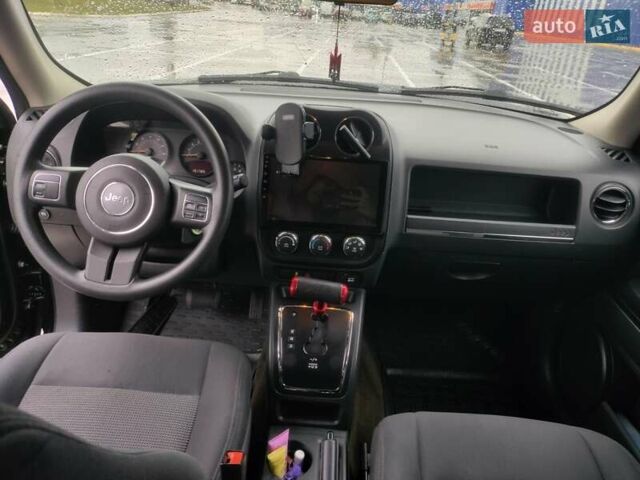 Черный Джип Патриот, объемом двигателя 2.36 л и пробегом 244 тыс. км за 10000 $, фото 2 на Automoto.ua