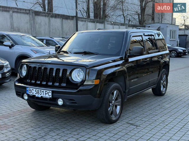 Чорний Джип Patriot, об'ємом двигуна 2.4 л та пробігом 128 тис. км за 10300 $, фото 2 на Automoto.ua