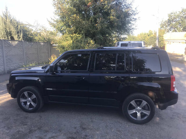 Черный Джип Патриот, объемом двигателя 2.36 л и пробегом 165 тыс. км за 13000 $, фото 6 на Automoto.ua