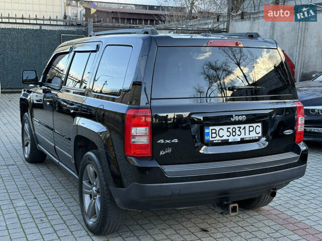 Чорний Джип Patriot, об'ємом двигуна 2.4 л та пробігом 128 тис. км за 10300 $, фото 4 на Automoto.ua