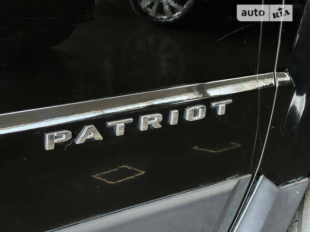 Чорний Джип Patriot, об'ємом двигуна 2 л та пробігом 145 тис. км за 11800 $, фото 11 на Automoto.ua