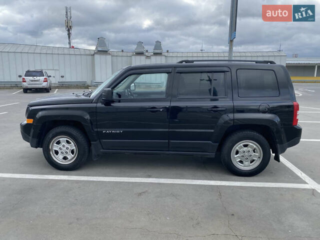 Черный Джип Патриот, объемом двигателя 2.36 л и пробегом 143 тыс. км за 10900 $, фото 6 на Automoto.ua