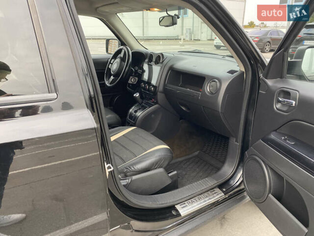 Черный Джип Патриот, объемом двигателя 2.36 л и пробегом 143 тыс. км за 10900 $, фото 5 на Automoto.ua