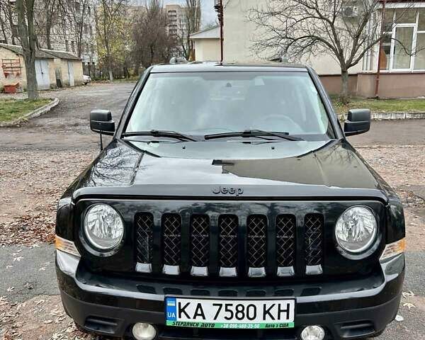 Чорний Джип Patriot, об'ємом двигуна 2.36 л та пробігом 188 тис. км за 12500 $, фото 1 на Automoto.ua