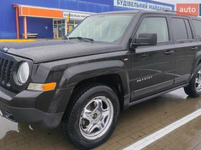 Черный Джип Патриот, объемом двигателя 2.36 л и пробегом 244 тыс. км за 10000 $, фото 4 на Automoto.ua
