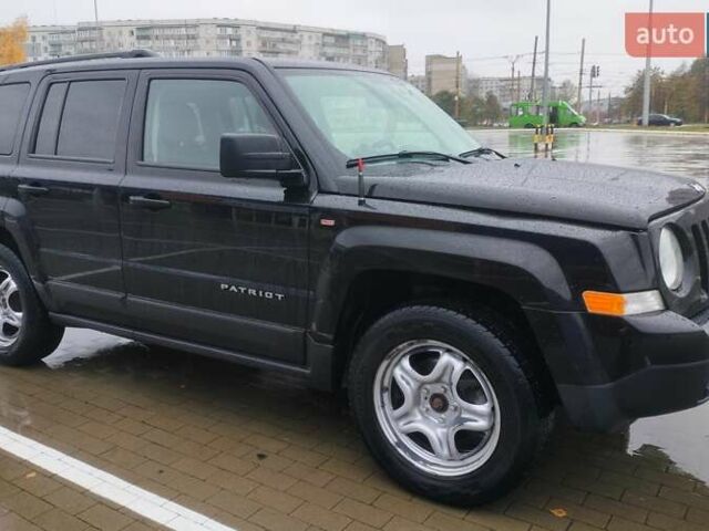 Черный Джип Патриот, объемом двигателя 2.36 л и пробегом 244 тыс. км за 10000 $, фото 3 на Automoto.ua