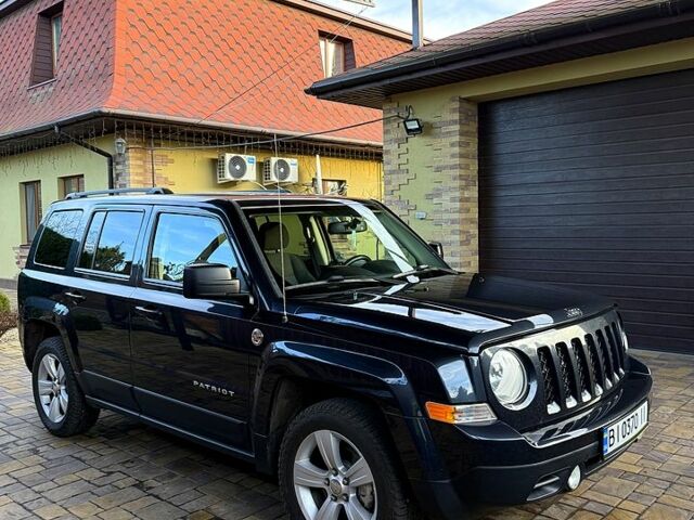 Черный Джип Патриот, объемом двигателя 2.4 л и пробегом 187 тыс. км за 9200 $, фото 1 на Automoto.ua