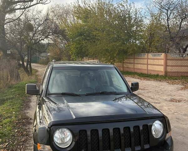 Черный Джип Патриот, объемом двигателя 2.36 л и пробегом 144 тыс. км за 10500 $, фото 12 на Automoto.ua